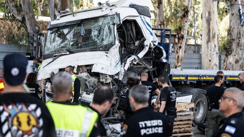 A view of the area as medical teams respond to dozens of people at the scene after a truck crashed into a bus stop, south of Tel Aviv