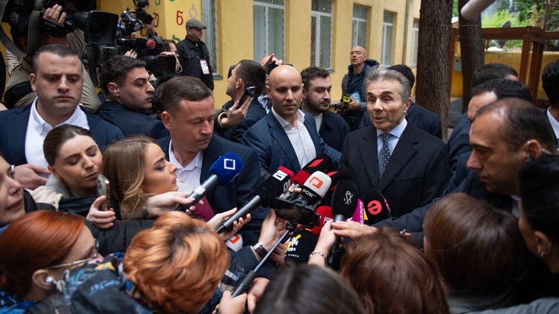 Georgian Dream founder Bidzina Ivanishvili speaks to the media after casting his vote