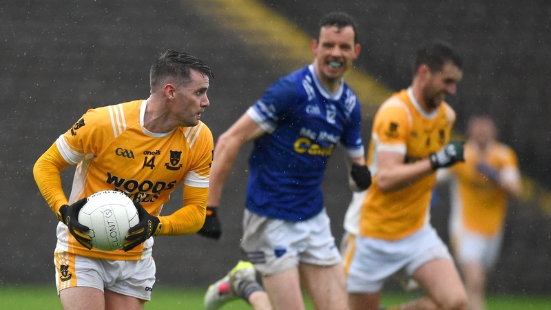Ryan McGuigan of Clontibret in action against James Hamill of Scotstown