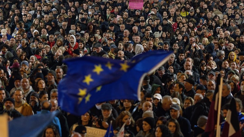 Thousands of people protested outside the Georgian Parliament building on Monday