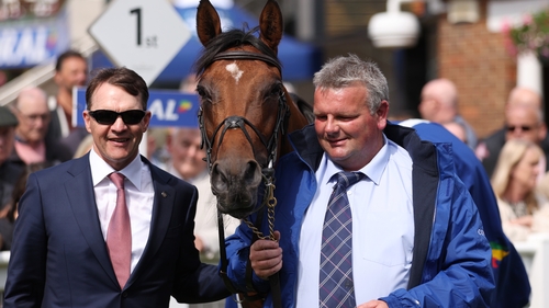 City Of Troy and trainer Aidan O'Brien (L) after winning the Coral-Eclipse at Sandown Park in July