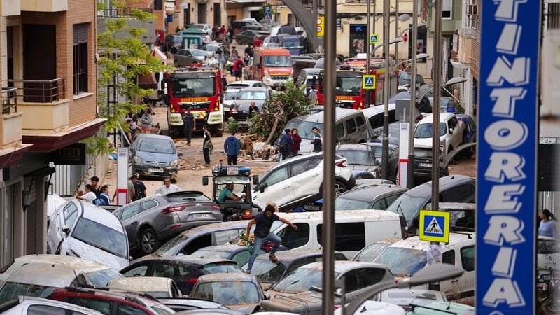 Cars piled up following deadly floods in Sedavi, south of Valencia, eastern Spain