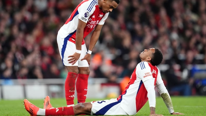 Gabriel (R) went off injured in the draw with Liverpool