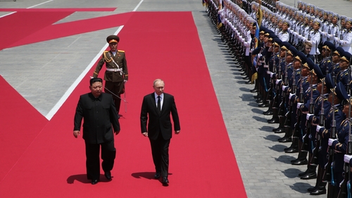 Russia's President Vladimir Putin and North Korea's leader Kim Jong Un attend a welcoming ceremony before talks in Pyongyang last June