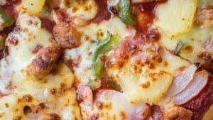 Pineapple on pizza and drinking milky coffee in the afternoon – crimes against Italian cooking show image