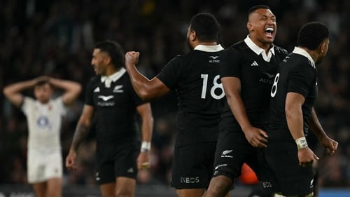New Zealand players celebrate a hardfought win