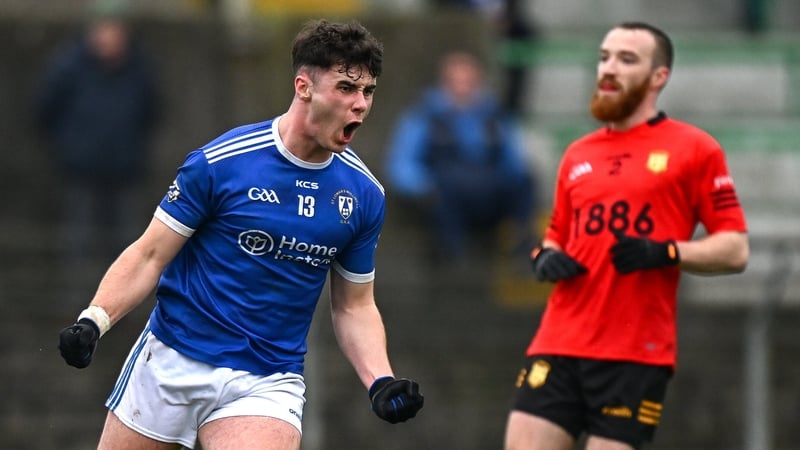 Danny McCartan of St Loman's (L) celebrates after scoring his side's second goal