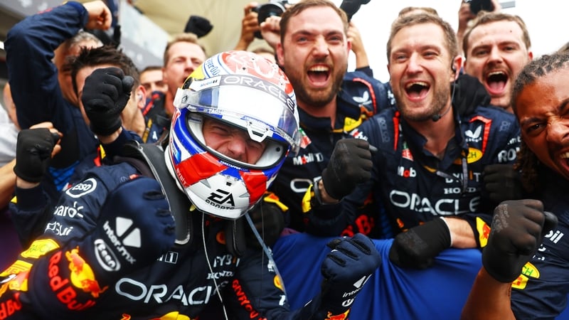 Max Verstappen celebrates his victory with his team