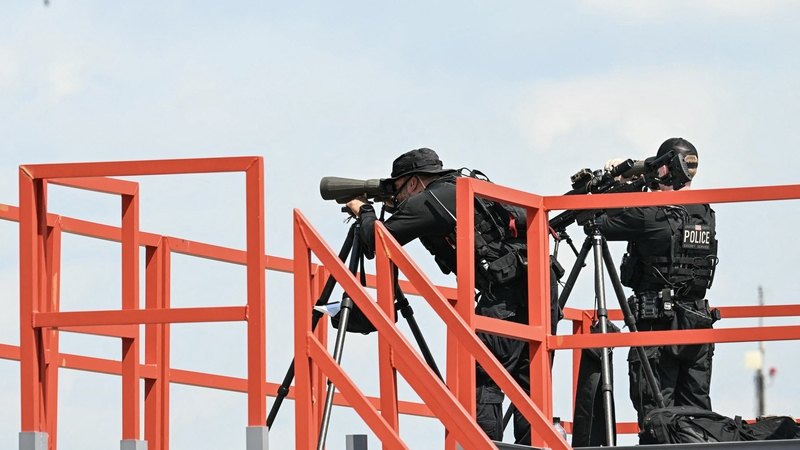 A US Secret Service sniper team standing guard as Marine One lands in Delaware earlier this year