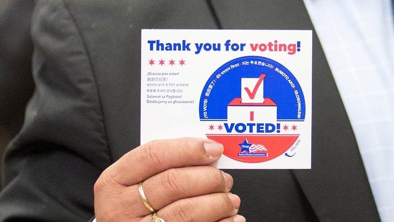 A voter with a 'I Voted' sticker in Chicago: 'opinion polls, in as far as they are useful, tell us that the presidential candidates are locked in a dead heat even in swing states.' Photo: Jacek Boczarski/Anadolu via Getty Images