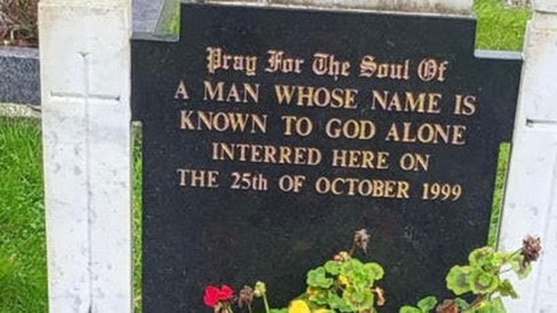 Locals in Bandon tend to the grave of the unidentified man