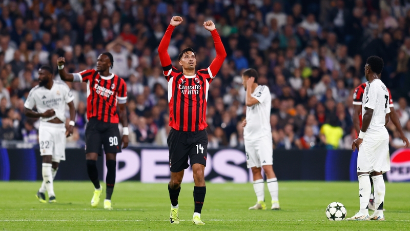 Tijjani Reijnders celebrates after firing home AC Milan's third goal