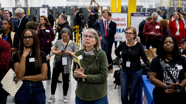 Members of the media and election observers await results in Fairburn, Georgia