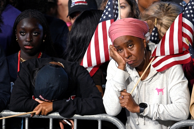 Supporters react to election results as they attend an election night event in Washington DC