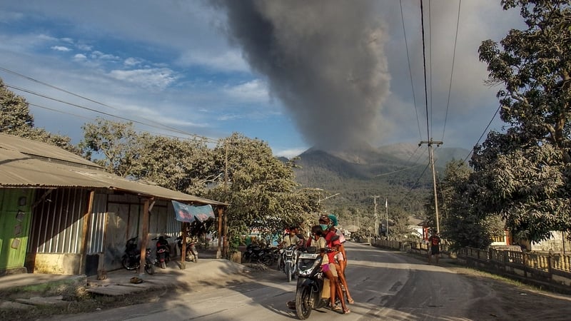 People flee as Mount Lewotobi Laki-Laki spews ash into the air