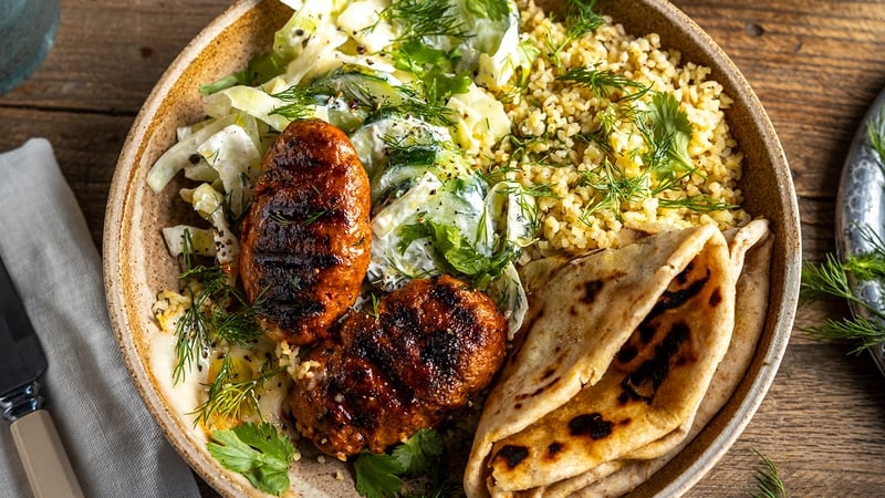This hearty bowl is filled with harissa lamb meatballs, with bulgur and garlicky yoghurt dressed vegetables.