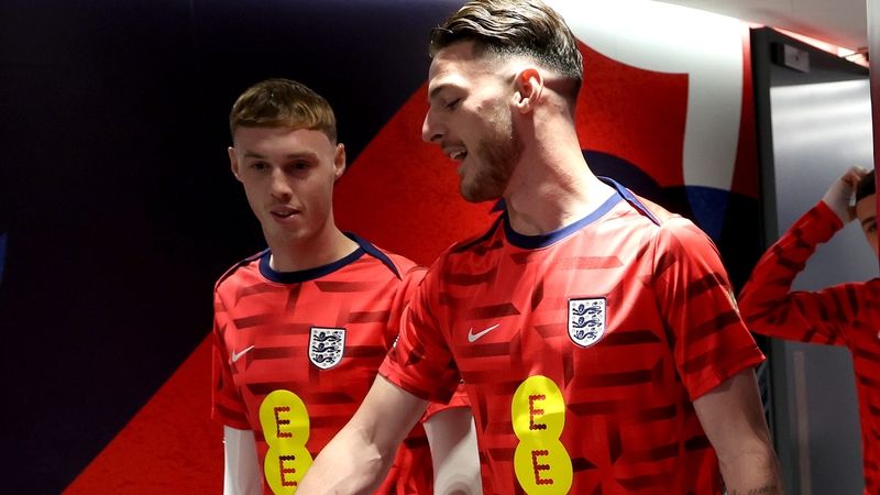 England team-mates Cole Palmer (L) and Declan Rice are in a fitness race for Sunday's Premier League showdown
