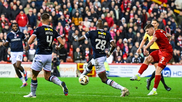 Aberdeen's Kevin Nisbet scores to make it 4-1 against Dundee