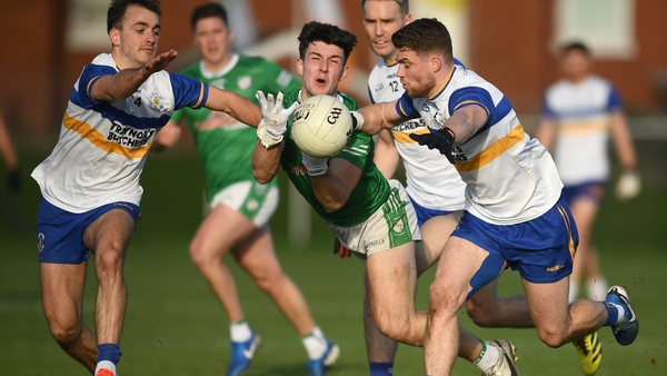 Conhuir Johnson of Cargin in action against Darragh Canavan and Niall Kelly of Errigal Ciarán