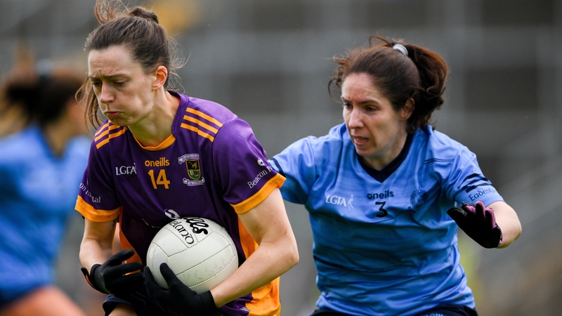 Michelle Davoren of Kilmacud Crokes is tackled by Denise Tierney of Eadestown