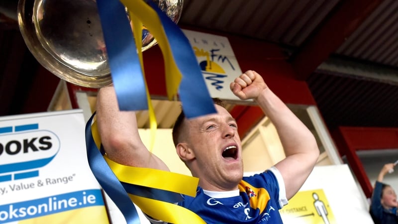 Loughrea captain Ian Hanrahan lifts the Tom Callanan Cup