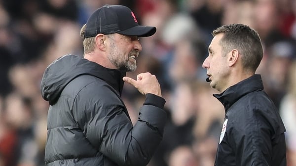 Jurgen Klopp (L) with David Coote