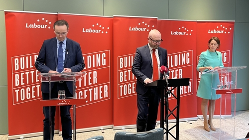 Labour's finance spokesperson Ged Nash (C) ruled out any cuts to the USC