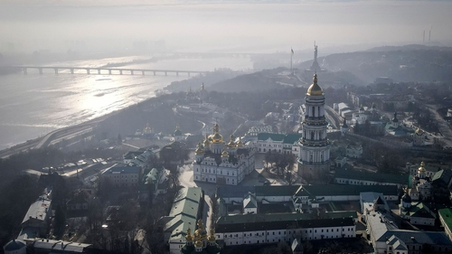 Explosions rang out over Kyiv while residents sought shelter in an underground metro station in the centre of the capital