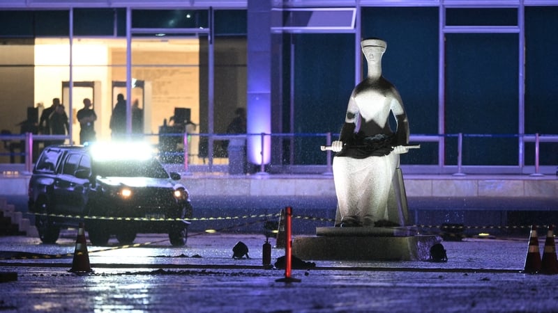 Police guarded the crime scene where a man died after an explosion in front of Brazil's Supreme Federal Court in Brasilia, Brazil