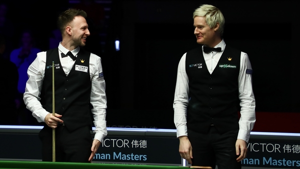 Neil Robertson (R) got the better of Judd Trump (L) of England chats with