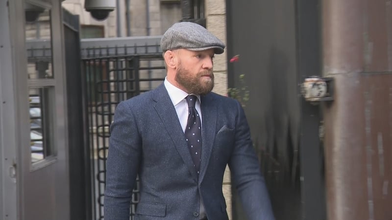 Conor McGregor (pictured) and James Lawrence deny the claims against them
