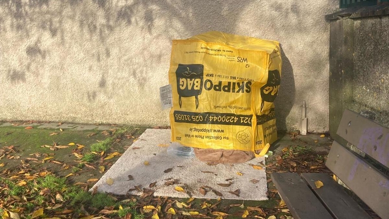 The woman was found asleep under the skip bag earlier this week