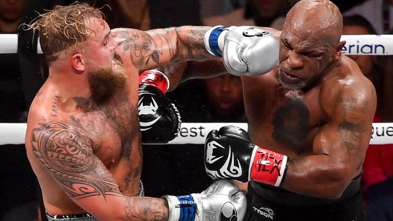 Jake Paul (L) and Mike Tyson during their heavyweight bout at AT&T Stadium in Arlington, Texas