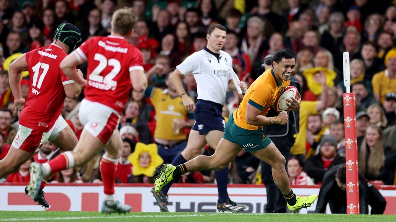Len Ikitau runs in another Australia try - their seventh - in Cardiff