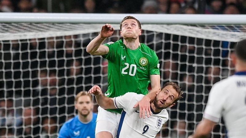 Mark McGuinness outleaps Harry Kane on his senior debut for Ireland
