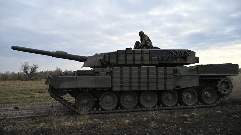 A Leopard 2A4 tank is seen during a field training at an undisclosed location in Ukraine on 27 October