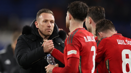 Craig Bellamy celebrates with Neco Williams