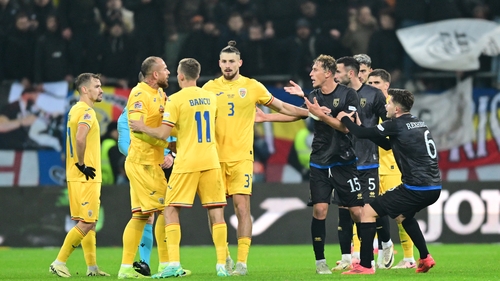 Kosovo and Romania players argue before leaving the pitch