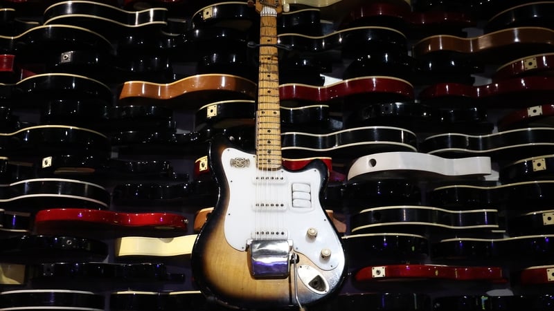 George Harrison's Futurama guitar sells for $1.27 million at auction, twice its initial estimate.