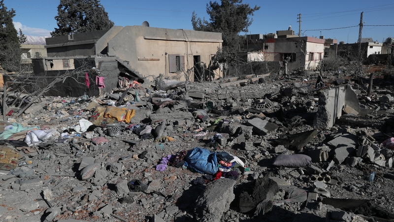 Civil defense teams remove rubble and carry out search and rescue operations among the rubble of buildings destroyed by Israeli attacks in Baalbek, Lebanon