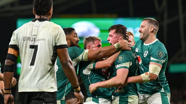 Ireland's players celebrate Gus McCarthy's debut try