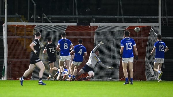 Jerome Johnston finds the net for Kilcoo's fourth