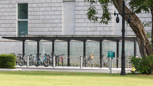 Construction on Leinster House's controversial €336,000 bicycle shelter had to be halted after a large manhole was 'discovered' on the site