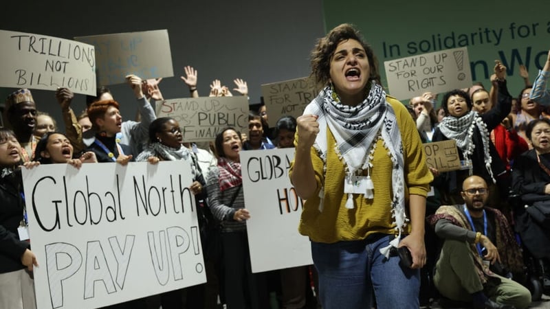 Activists protested for climate finance grants for poor countries as negotiators had walked out of overtime consultations on a climate deal
