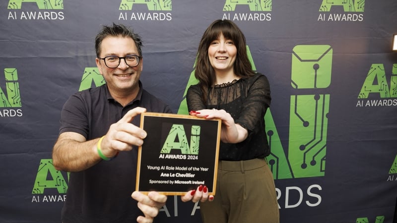 Kieran McCorry, National Technology Officer at Microsoft Ireland presenting Ana Le Chevillier, Clinical Research Manager - Data and AI at AI PREMie with the Young AI Role Model of the Year award.