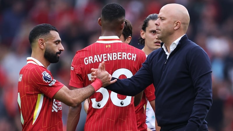 Mo Salah (L) with Arne Slot