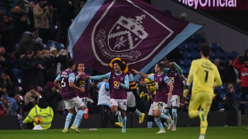 Former Ireland underage international CJ Egan-Riley (left) celebrates his Burnley goal with team-mates, including Josh Cullen