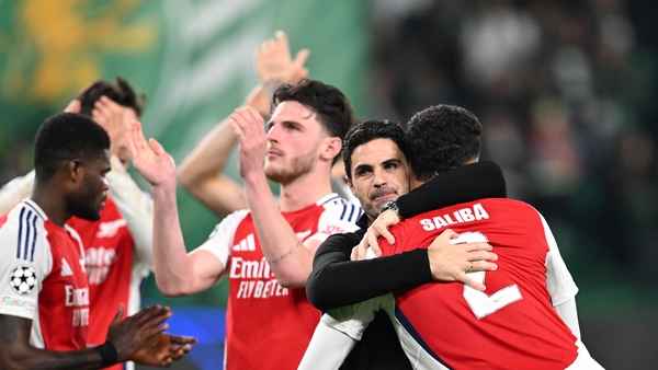 Mikel Arteta embraces defender William Saliba after Arsenal's emphatic win
