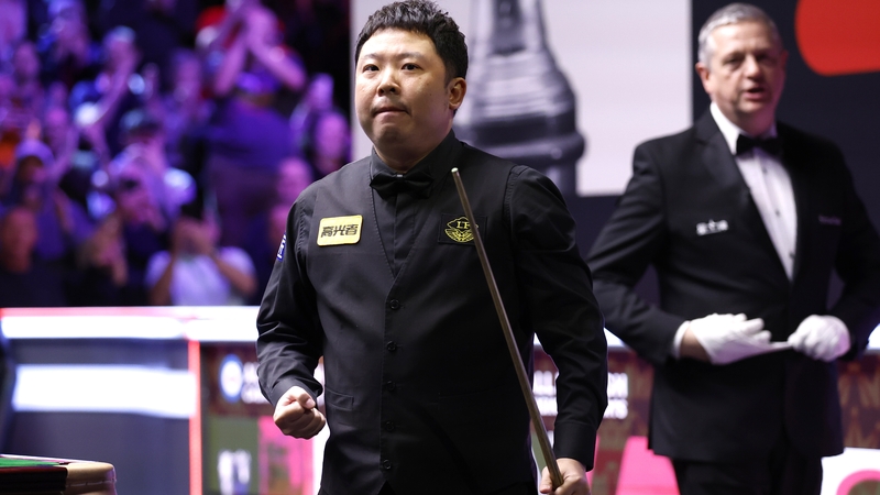 Zhang Anda celebrates making the third 147 of his career