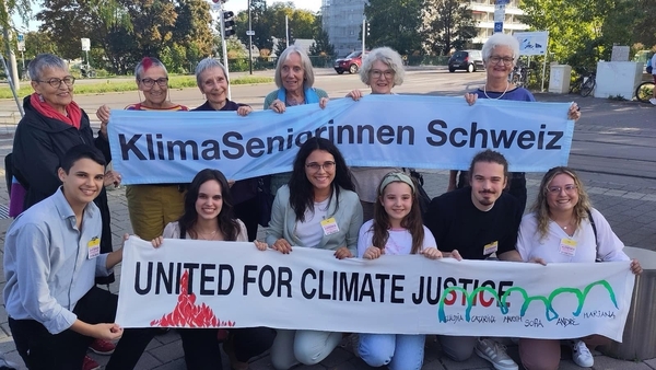 (L-R) Portuguese applicants Andre, Sofia, Catarina, Mariana, Martim and Claudia with Swiss activists at the European court of Human Rights